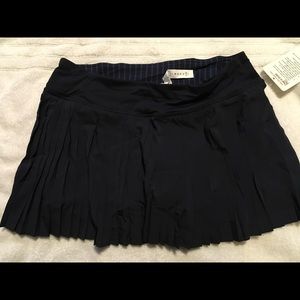PLEAT TO STREET SKIRT SZ.8 NAVY